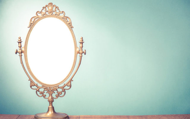 image of an antique mirror on a table with no reflection