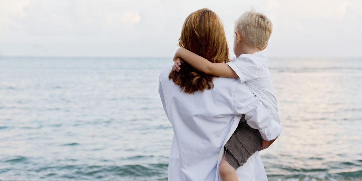 image of a mother and son looking out at the ocean