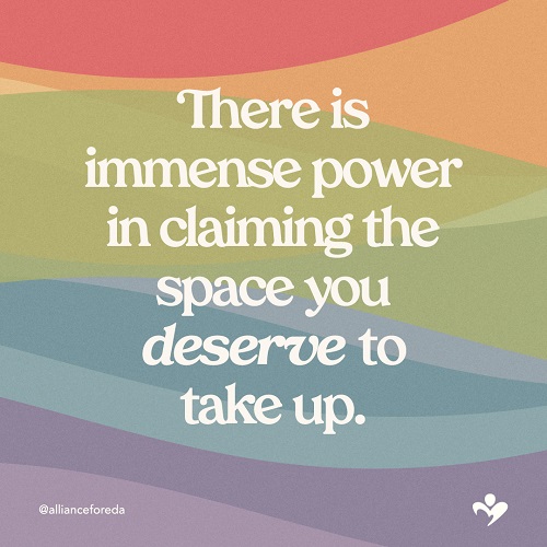 rainbow background with white text that reads 