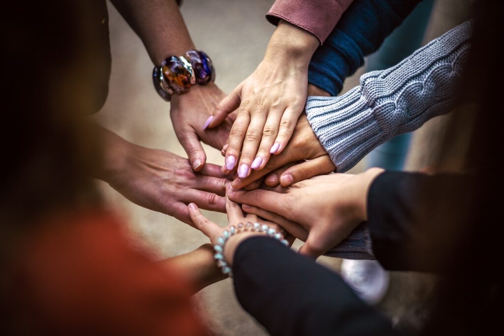 people holding hands 