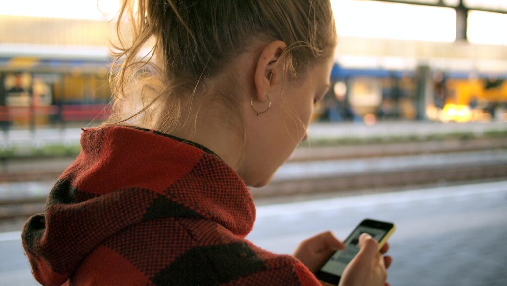 woman looking at phone