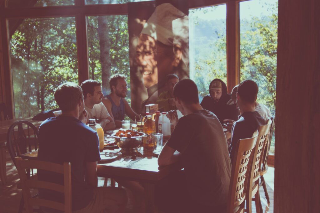 Group of friends eating together at a restaurant.